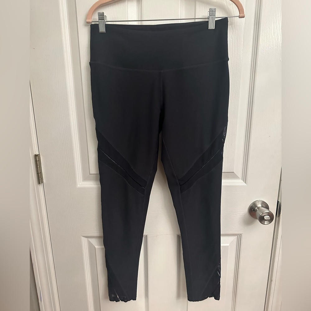 Fun mesh cut our leggings with great tummy control